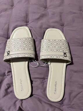 Calvin Klein Ivory Monogram Slide Sandals